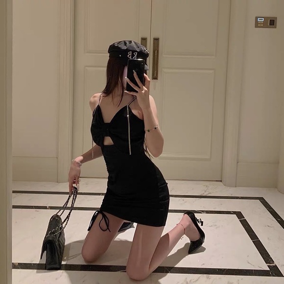 Cute black dress with silver straps - Picture 1 of 5